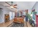 Open living area with leather couches, fireplace and access to kitchen at 2336 Parkstone Dr, Charleston, SC 29414
