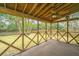 Screened porch with ceiling fan and backyard view at 2336 Parkstone Dr, Charleston, SC 29414