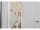 Small powder room with toilet and decorative accents at 2670 Lamina Ct, Mount Pleasant, SC 29466