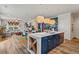 Modern kitchen with a large island, blue cabinetry, and white countertops at 2670 Lamina Ct, Mount Pleasant, SC 29466