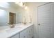 Elegant bathroom with dual sinks, quartz countertops, and ample storage at 2910 Clearwater Dr, Mount Pleasant, SC 29466