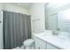 Clean bathroom with shower, toilet and a modern vanity with quartz countertop at 2910 Clearwater Dr, Mount Pleasant, SC 29466