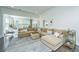 Spacious living room with large sectional sofa and sunroom access at 2910 Clearwater Dr, Mount Pleasant, SC 29466
