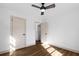 Simple bedroom with hardwood floors and neutral walls at 308 W 2Nd North St, Summerville, SC 29483