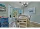 Bright dining area with a round table and chairs near a window at 3246 John Bartram Pl, Mount Pleasant, SC 29466