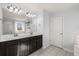 Double vanity bathroom with a walk-in shower at 339 Spectrum Rd, Summerville, SC 29486