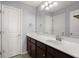 Bathroom with dark vanity and large mirror at 339 Spectrum Rd, Summerville, SC 29486