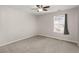 Simple bedroom with ceiling fan and window at 339 Spectrum Rd, Summerville, SC 29486