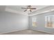 Spacious bedroom with two windows and ceiling fan at 339 Spectrum Rd, Summerville, SC 29486