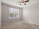 Bright bedroom with ceiling fan and large window at 339 Spectrum Rd, Summerville, SC 29486