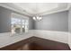 Formal dining room features hardwood floors and chair rail molding at 339 Spectrum Rd, Summerville, SC 29486