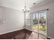 Bright dining room with hardwood floors and sliding glass doors to backyard at 339 Spectrum Rd, Summerville, SC 29486
