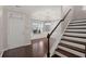 Hardwood floor entryway with staircase and door to living room at 339 Spectrum Rd, Summerville, SC 29486