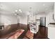 Open concept kitchen with island, hardwood floors and stainless steel appliances at 339 Spectrum Rd, Summerville, SC 29486
