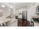 Kitchen features granite countertops, stainless steel appliances and hardwood floors at 339 Spectrum Rd, Summerville, SC 29486