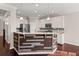 Kitchen features granite countertops, custom island, and stainless steel appliances at 339 Spectrum Rd, Summerville, SC 29486