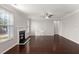 Spacious living room with hardwood floors, fireplace, and ceiling fan at 339 Spectrum Rd, Summerville, SC 29486