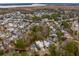 Aerial view of a neighborhood with marsh views, showcasing a white two-story home at 341 Bridgetown Pass, Mount Pleasant, SC 29464
