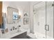 Modern bathroom with glass shower and marble vanity at 341 Bridgetown Pass, Mount Pleasant, SC 29464