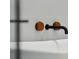 Close up of modern bathtub fixtures with wooden accents at 341 Bridgetown Pass, Mount Pleasant, SC 29464