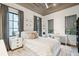 Bright bedroom with white bedding and built-in desk at 341 Bridgetown Pass, Mount Pleasant, SC 29464
