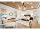 Serene bedroom with high ceilings, a cozy sitting area, and ample natural light at 341 Bridgetown Pass, Mount Pleasant, SC 29464