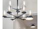 Sleek modern chandelier with glass shades, adds elegance at 341 Bridgetown Pass, Mount Pleasant, SC 29464