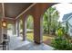 Covered walkway with arched entryway and landscaping at 341 Bridgetown Pass, Mount Pleasant, SC 29464