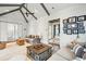 Spacious game room with vaulted ceiling and comfortable seating at 341 Bridgetown Pass, Mount Pleasant, SC 29464