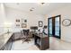 Modern home office with L-shaped desk, and French doors at 341 Bridgetown Pass, Mount Pleasant, SC 29464