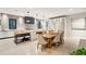 Open concept kitchen with white cabinets and geometric backsplash at 341 Bridgetown Pass, Mount Pleasant, SC 29464