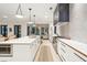 Open concept kitchen with island, stainless steel appliances, and a breakfast bar at 341 Bridgetown Pass, Mount Pleasant, SC 29464