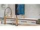Close-up of elegant gold kitchen faucets with modern design at 341 Bridgetown Pass, Mount Pleasant, SC 29464