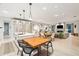 Open concept kitchen and living area with hardwood floors at 341 Bridgetown Pass, Mount Pleasant, SC 29464