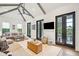 Relaxing living room with vaulted ceilings, and access to balcony at 341 Bridgetown Pass, Mount Pleasant, SC 29464