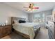 Main bedroom with wood platform bed and ceiling fan at 356 Peters Creek Dr, Summerville, SC 29486