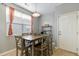 Cozy dining area with table and chairs, and access to kitchen at 356 Peters Creek Dr, Summerville, SC 29486