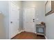 Front entry with white door, wood floors, and side closet at 356 Peters Creek Dr, Summerville, SC 29486