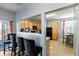 Kitchen with light wood cabinets, black appliances, and a breakfast bar at 356 Peters Creek Dr, Summerville, SC 29486
