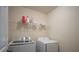 Laundry room with washer, dryer, and shelving at 356 Peters Creek Dr, Summerville, SC 29486