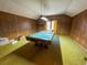 Game room with pool table and wood paneling at 388 Benton Farm Rd, Walterboro, SC 29488