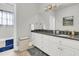 Modern bathroom with granite countertop and white cabinets at 4263 Persimmon Woods Dr, North Charleston, SC 29420