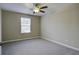 Spacious bedroom with ceiling fan and carpet flooring at 484 Whispering Breeze Ln, Summerville, SC 29486