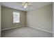 Bright bedroom with ceiling fan and carpet flooring at 484 Whispering Breeze Ln, Summerville, SC 29486