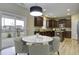 Modern kitchen with dark wood cabinets and granite countertops at 484 Whispering Breeze Ln, Summerville, SC 29486