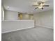Bright and airy loft with ceiling fan and neutral carpeting at 484 Whispering Breeze Ln, Summerville, SC 29486