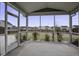 Enjoy the view from this screened porch at 484 Whispering Breeze Ln, Summerville, SC 29486