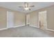 Spacious bedroom with carpet flooring and access to a full bathroom at 519 Travelers Blvd, Summerville, SC 29485