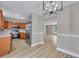 Open kitchen with stainless steel appliances and hardwood floors at 519 Travelers Blvd, Summerville, SC 29485