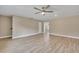 Open living room with hardwood floors and neutral color palette at 519 Travelers Blvd, Summerville, SC 29485
